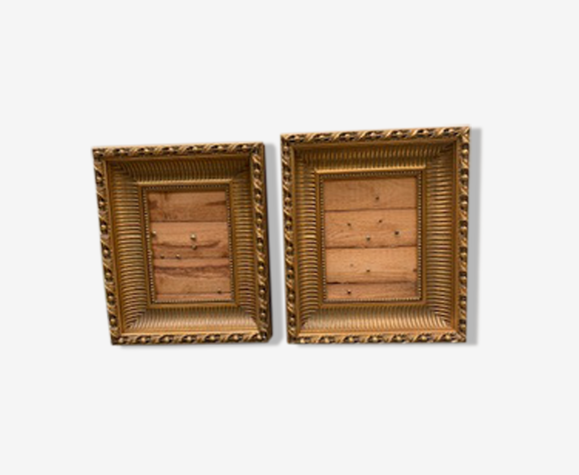 Cadres stuc doré planches bois brut