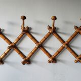 Extendable wooden coat holder