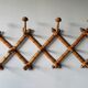 Extendable wooden coat holder
