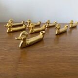 Set of 8 antique privilege knife holders gold metal duck vintage