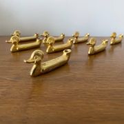 Set of 8 antique privilege knife holders gold metal duck vintage