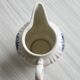 Porcelain sauce boat with blue pastoral pattern