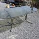 Silver metal table with smoked glass top from the 1970s.