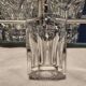 Baccarat 7 crystal liqueur glasses signed Model Harcourt on a stand.