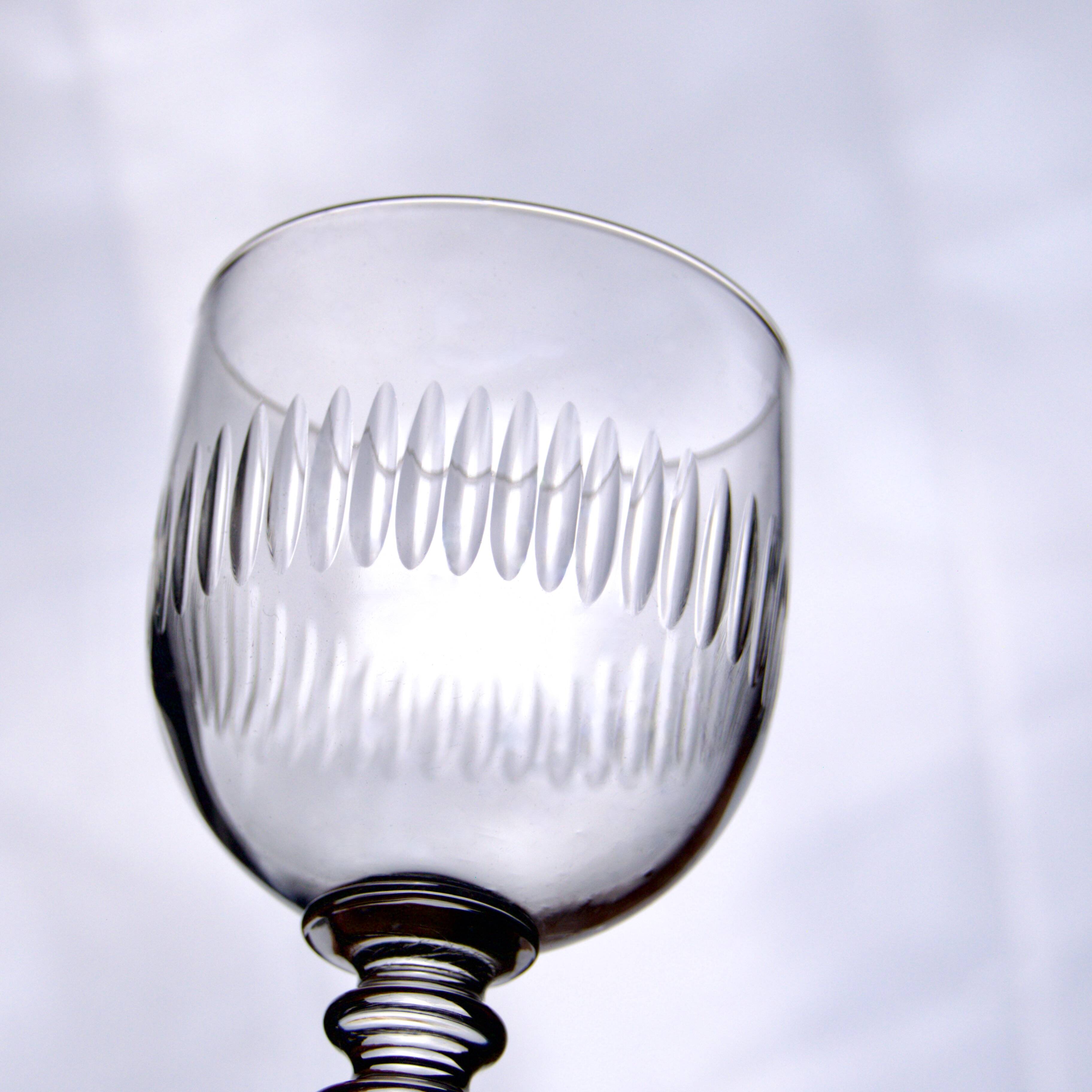 Antique 19th century mouth-blown glasses with gadroon carving