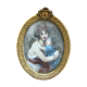 Belle miniature et son cadre en laiton doré