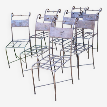 Series of 8 wrought iron garden chairs
