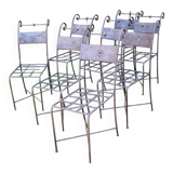 Series of 8 wrought iron garden chairs