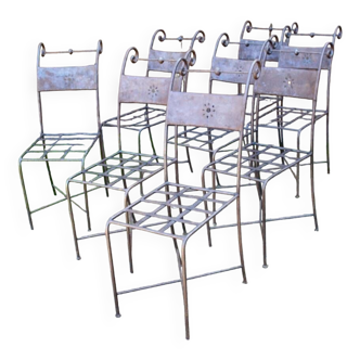 Series of 8 wrought iron garden chairs