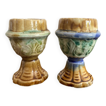 Antique egg cups in slip