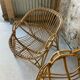 Vintage wicker armchair from the 1970s.
