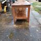 Table de drapier en pin , 2 tiroirs .