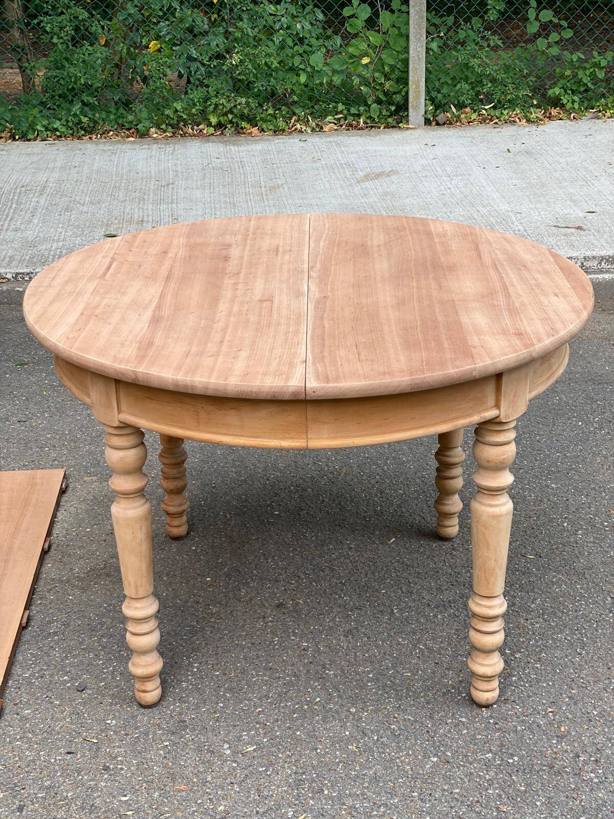 Round extendable dining table stripped in solid cherry wood France 1950