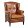 Sheepskin wingback armchair with stitching and black piping