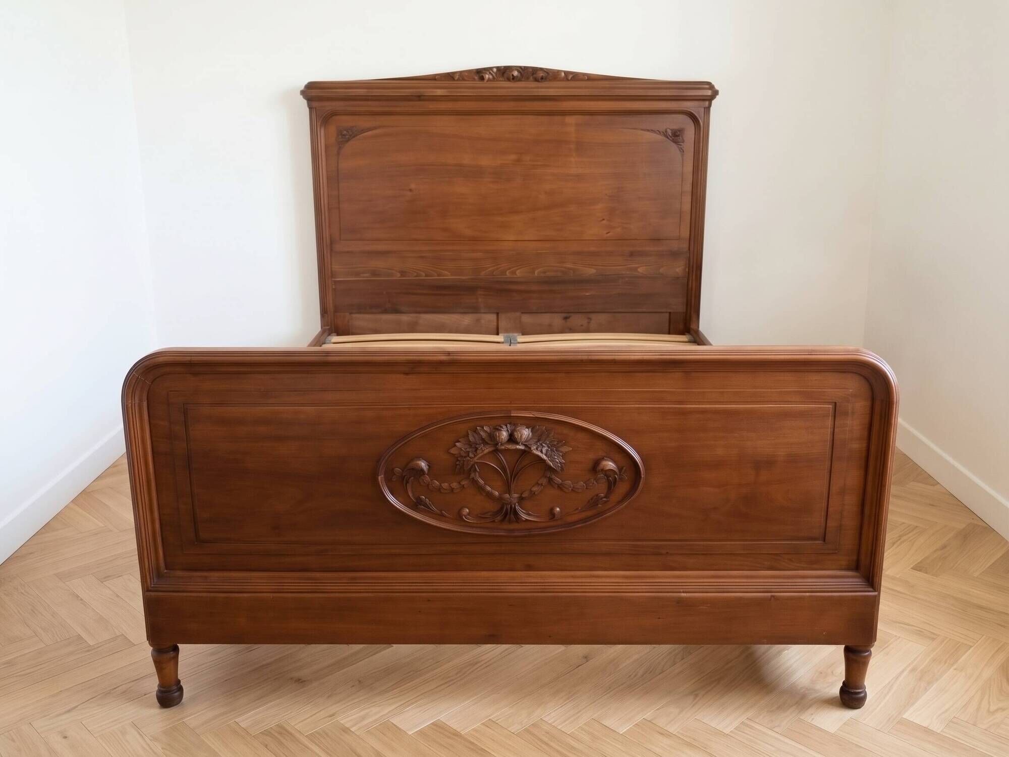 Antique carved wooden double bed