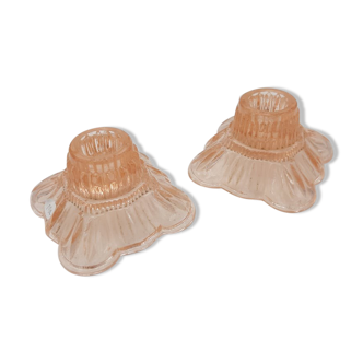 Pair of pink candle holders