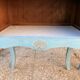 Pair of patinated lagoon blue bedside tables, early 20th century, with curved legs.