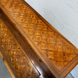 Cylinder desk with marquetry featuring a crosshatch design.