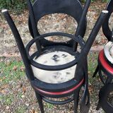 6 vintage Baumann seagull model chairs, black lacquered with red Skai seats.