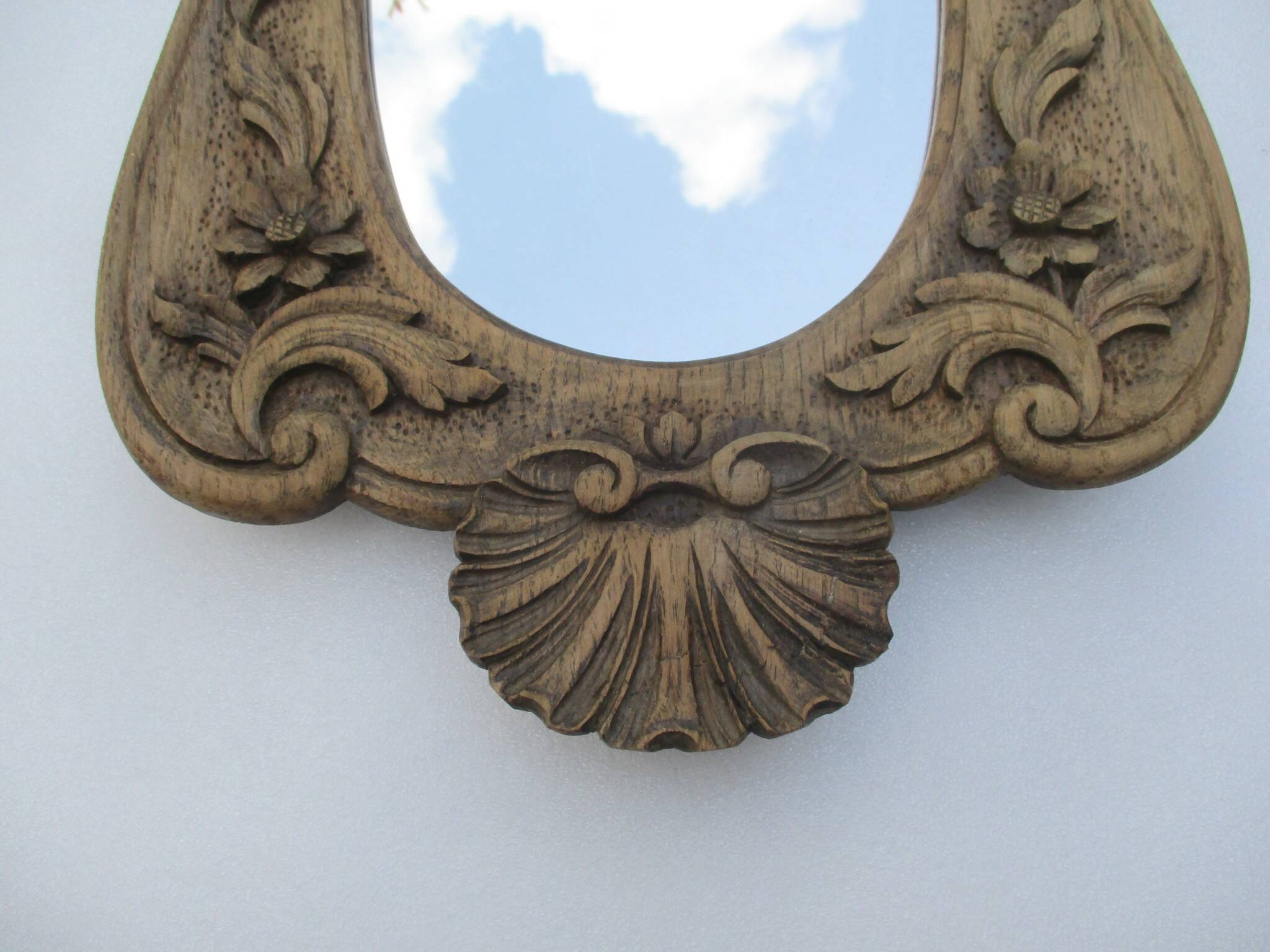 Antique carved wooden mirror