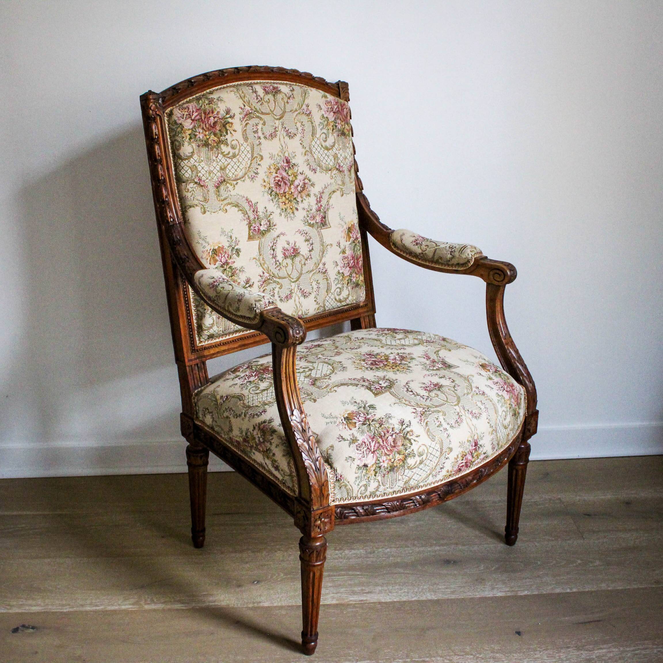 Louis XVI style carved armchair