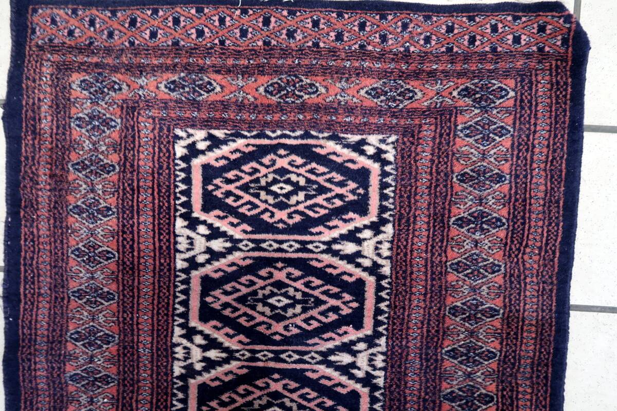 Handmade vintage 1960s Uzbek Bukhara rug – small wool tribal carpet (65cm x 95cm)