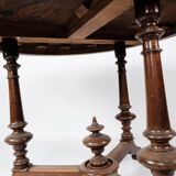 Round dining table of walnut with inlaid wood, 1890s
