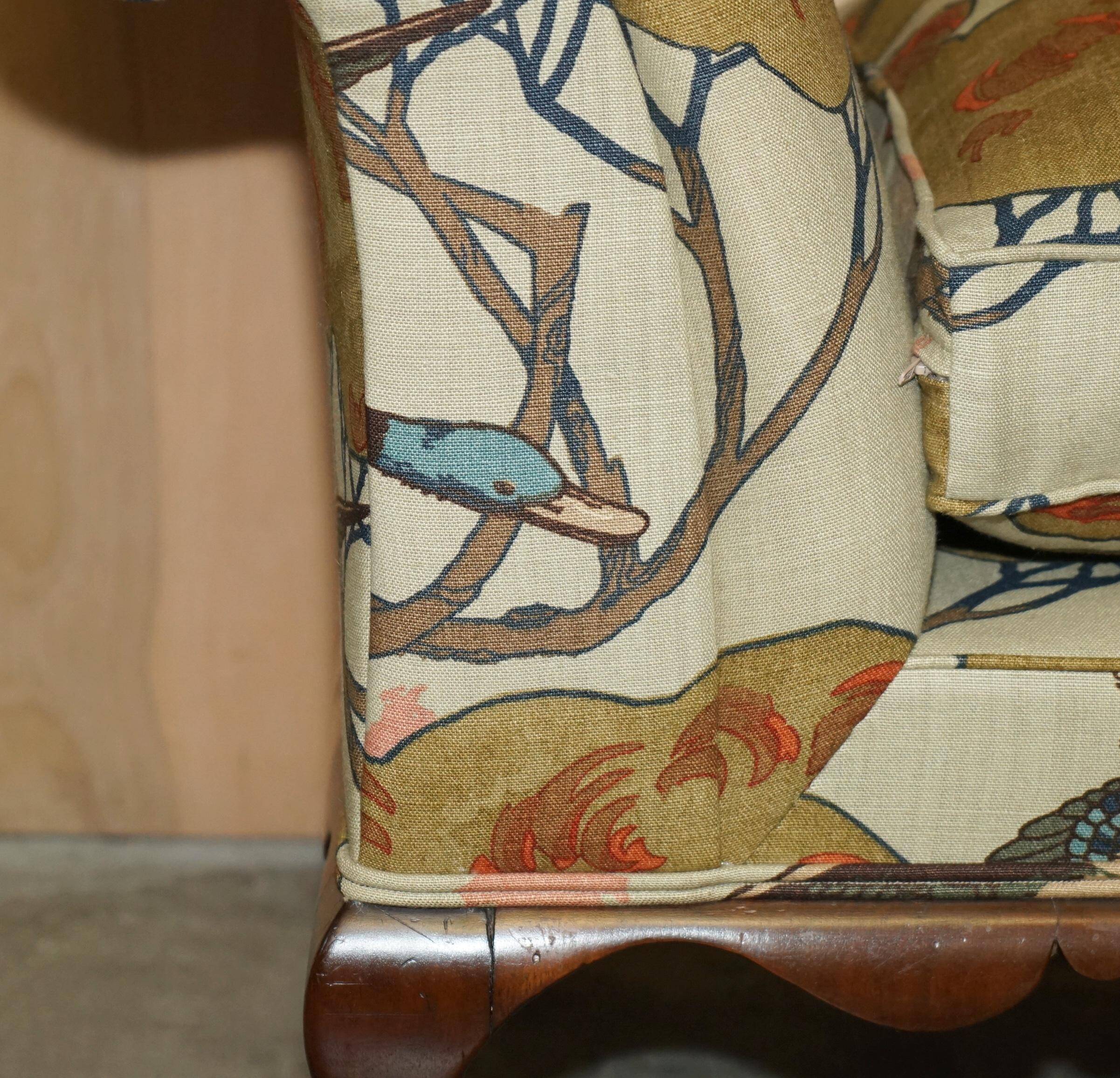 Antique banquette with cluster and ball feet, window seat in Mulberry Flying Ducks fabric.