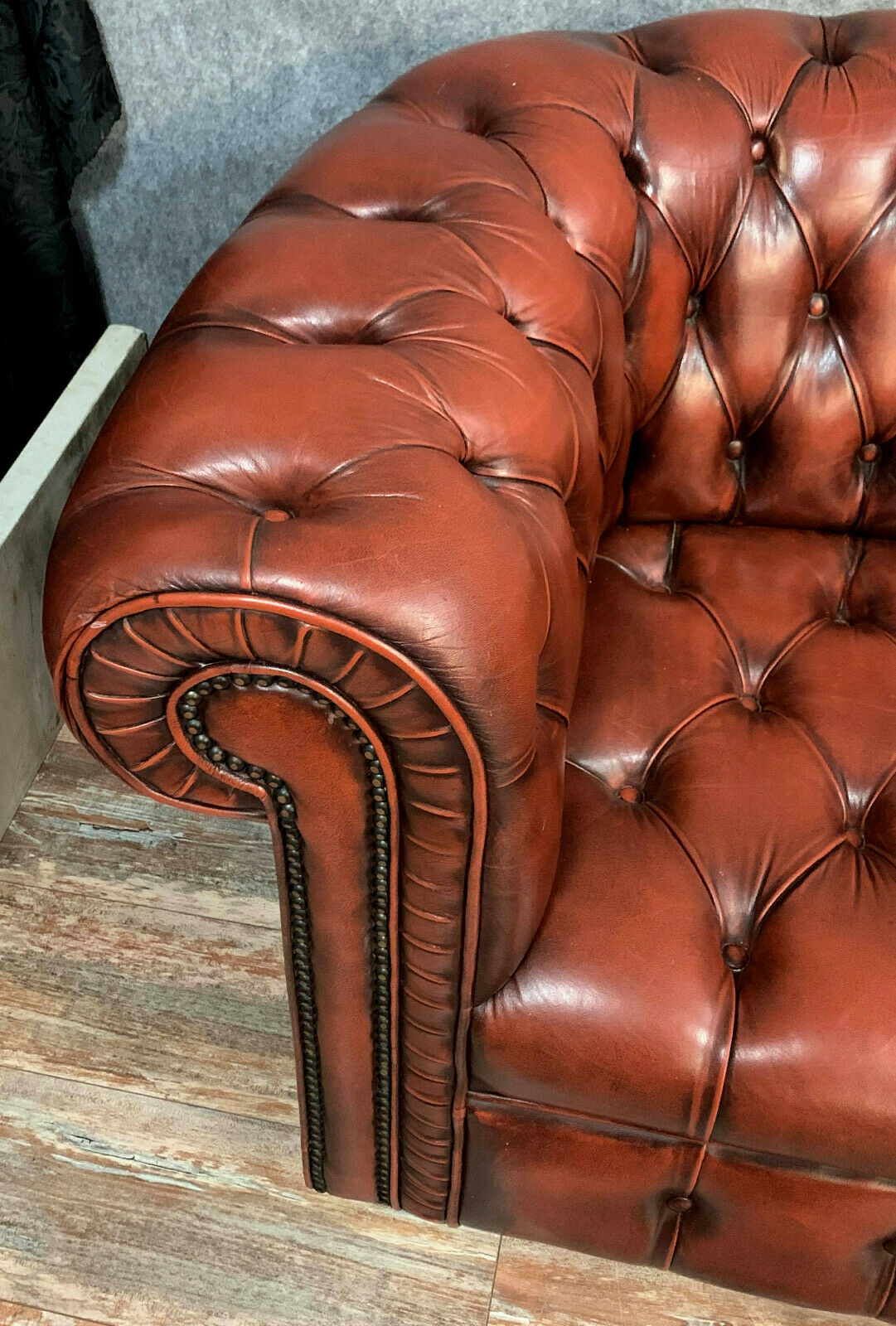 Chesterfield sofa in burgundy upholstered leather circa 1920