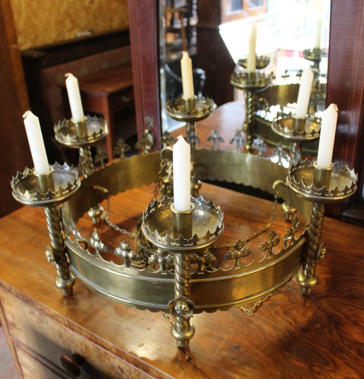 Brass chandelier in the style of Pugin with candles