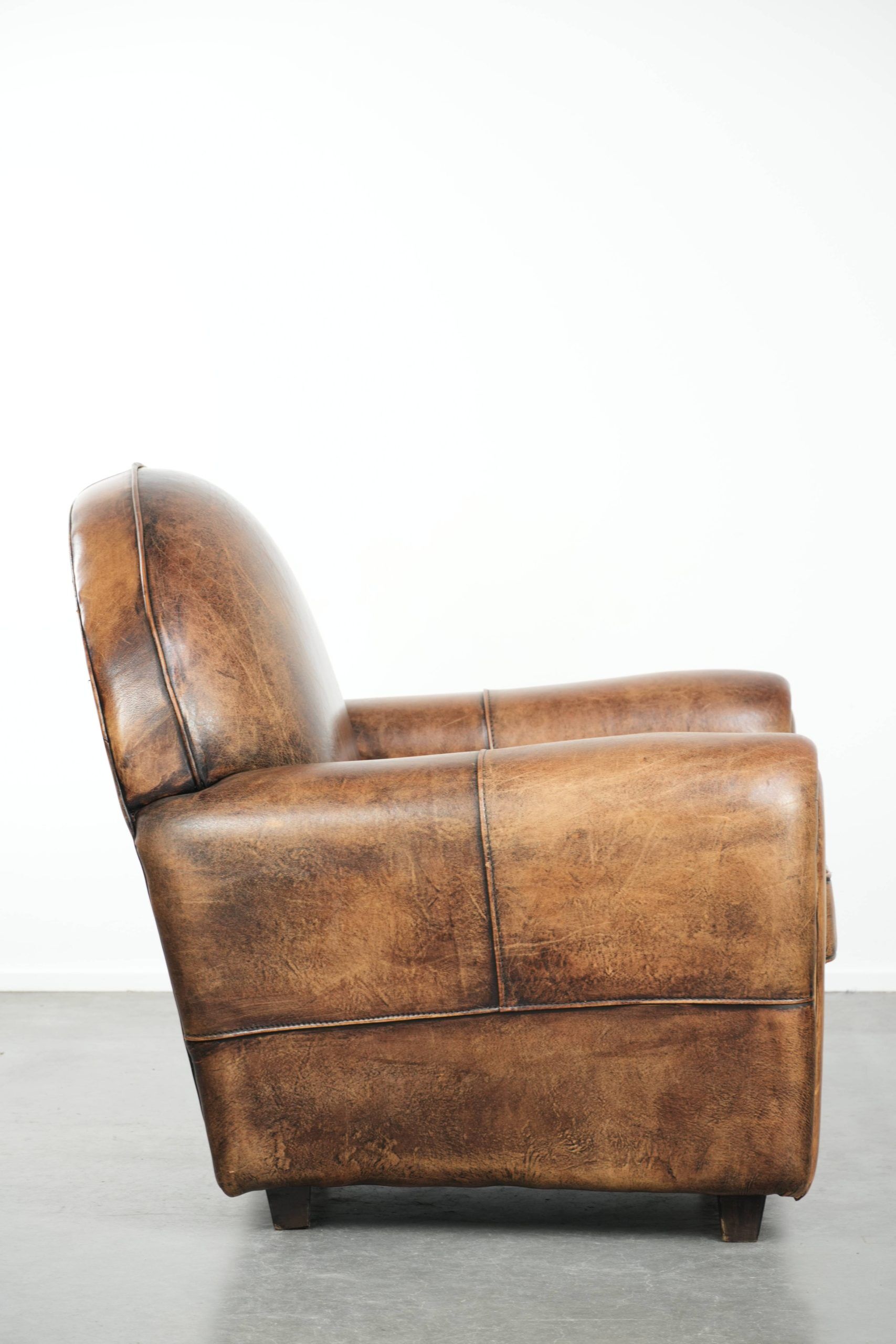 Armchair made of sheepskin leather in Art Deco design with beautiful patina