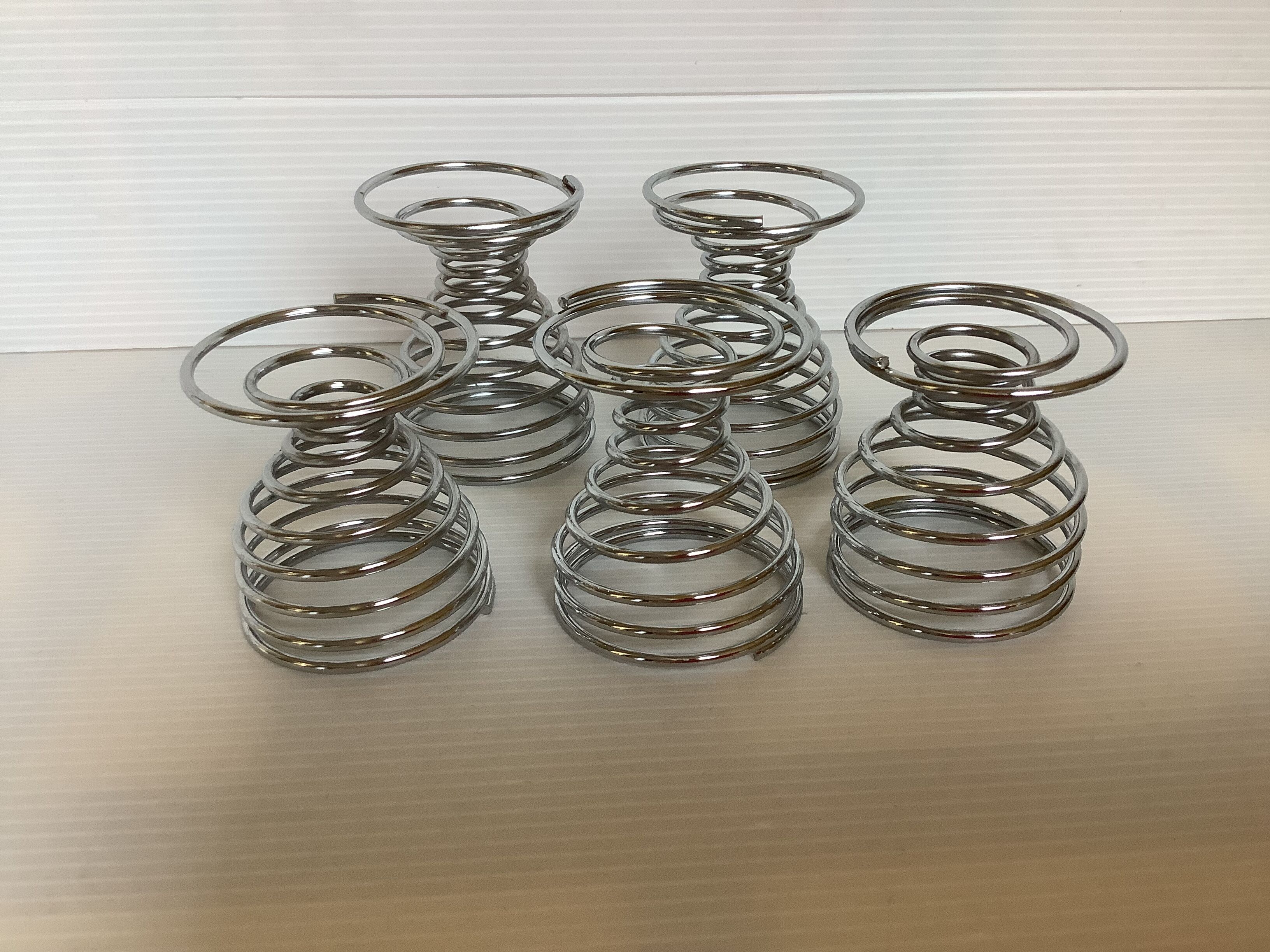 Five spiral spring eggcups