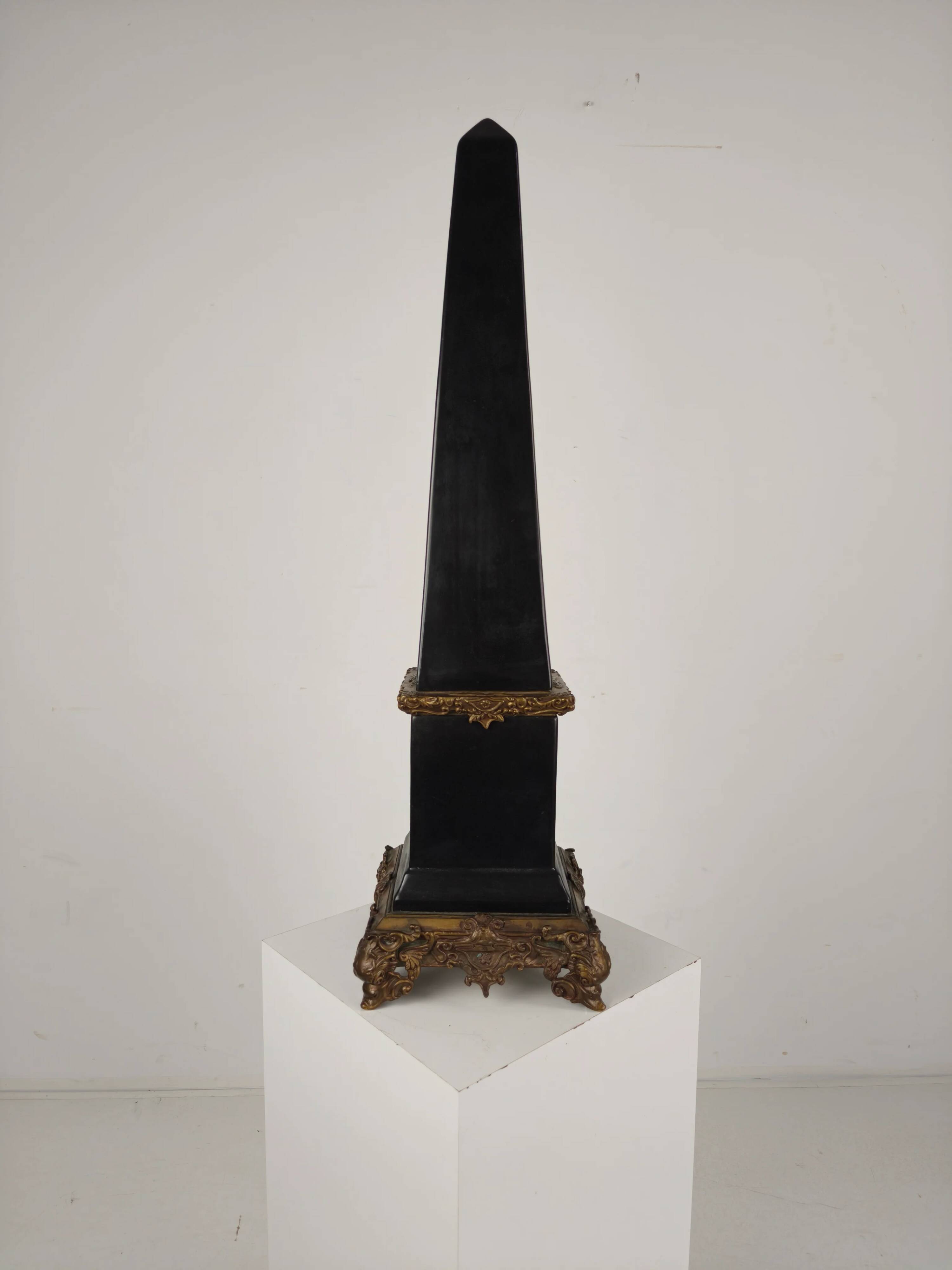 Black porcelain obelisk with bronze ornaments