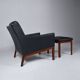 Leather armchair and footstool by Kai Lyngfeldt-Larsen. Denmark 1960s