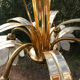 Brass chandelier and flowers in mother-of-pearl petals
