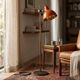 Vintage orange-red floor lamp with chrome.