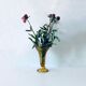 Ancient tulip vase in amber glass