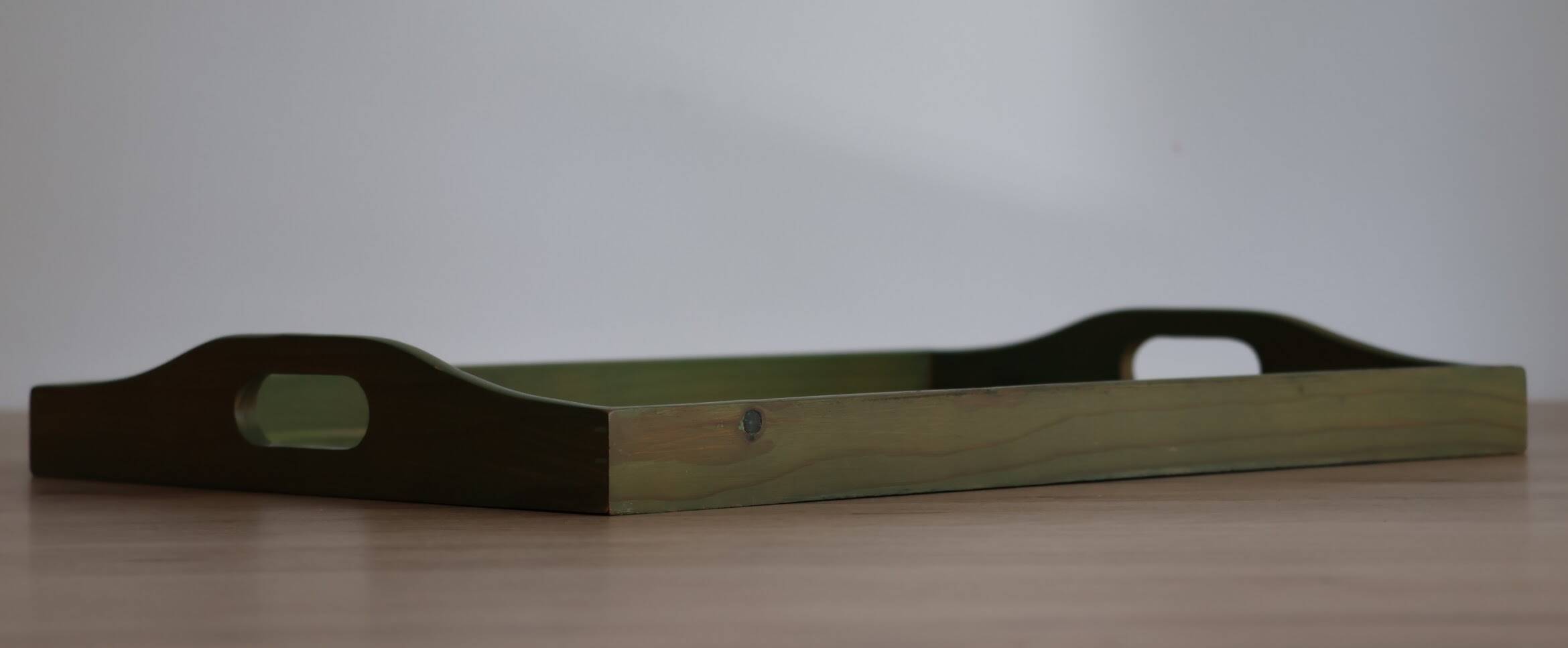 Wooden serving tray with fruit decor in green color