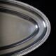 Large oval silver-plated metal serving platter with gadrooned edge – hallmarked