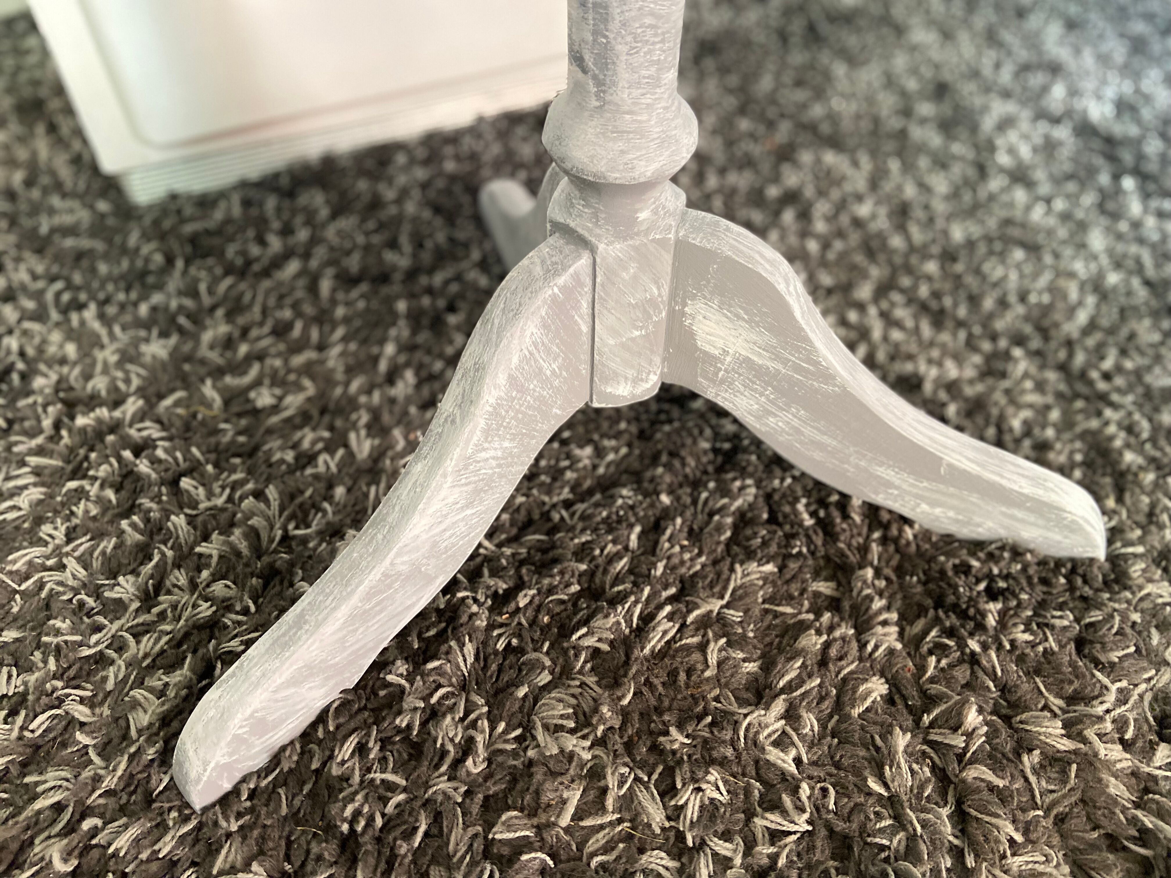 Patinated wooden pedestal table