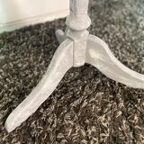 Patinated wooden pedestal table