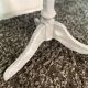 Patinated wooden pedestal table