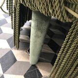 Toad in green velvet sofa