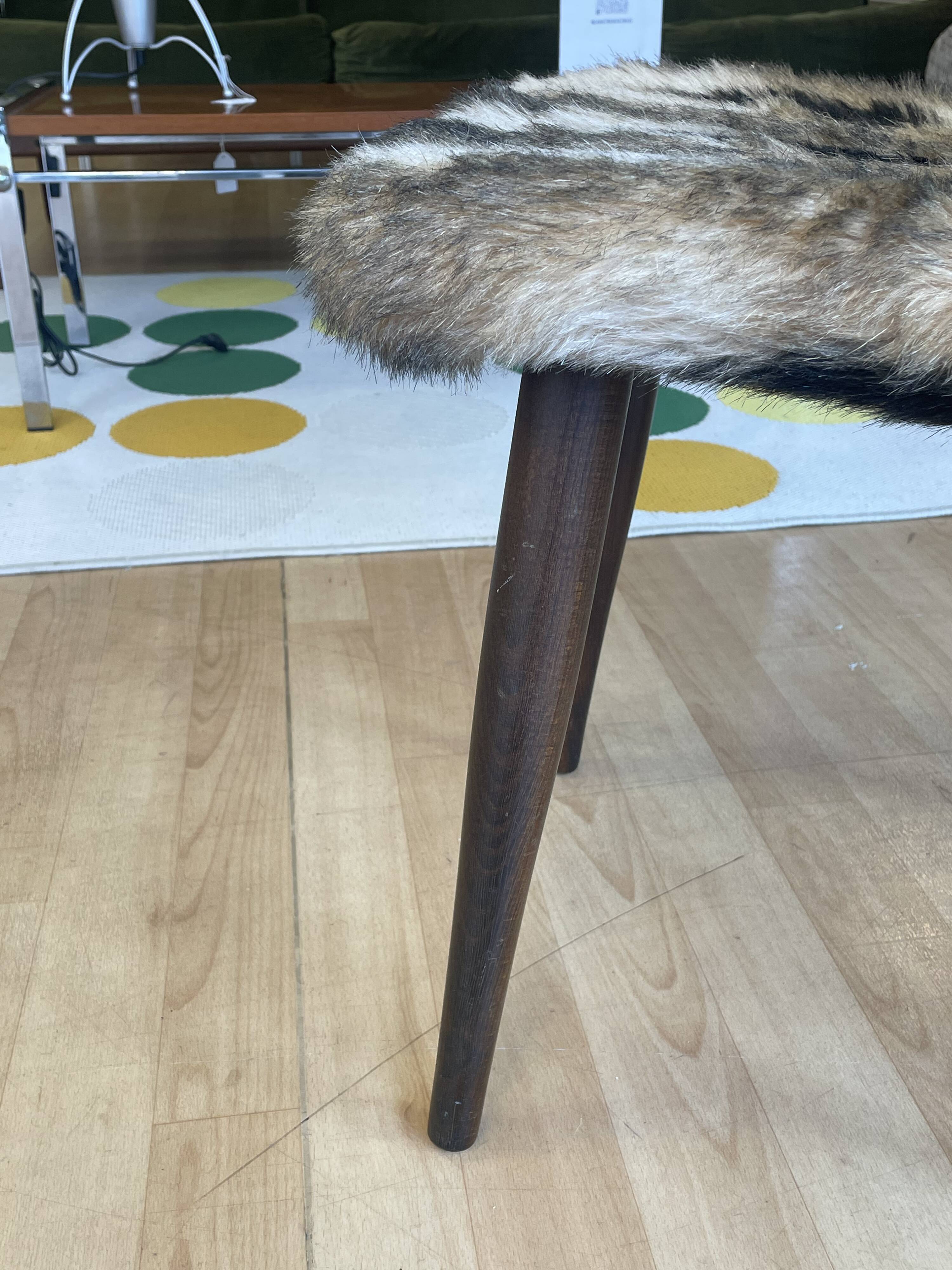 Faux fur chair with patterns & tapered dark wood legs