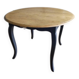 Antique extendable round table with Louis XV style extension