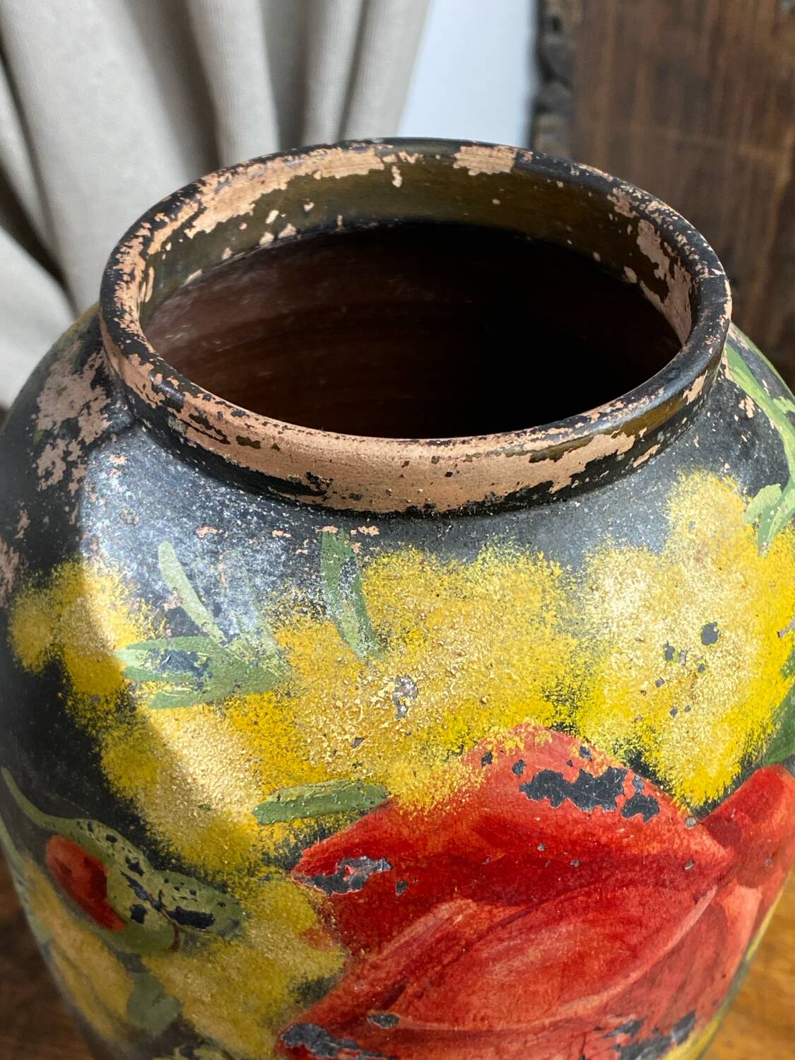 Terracotta vase with floral decoration