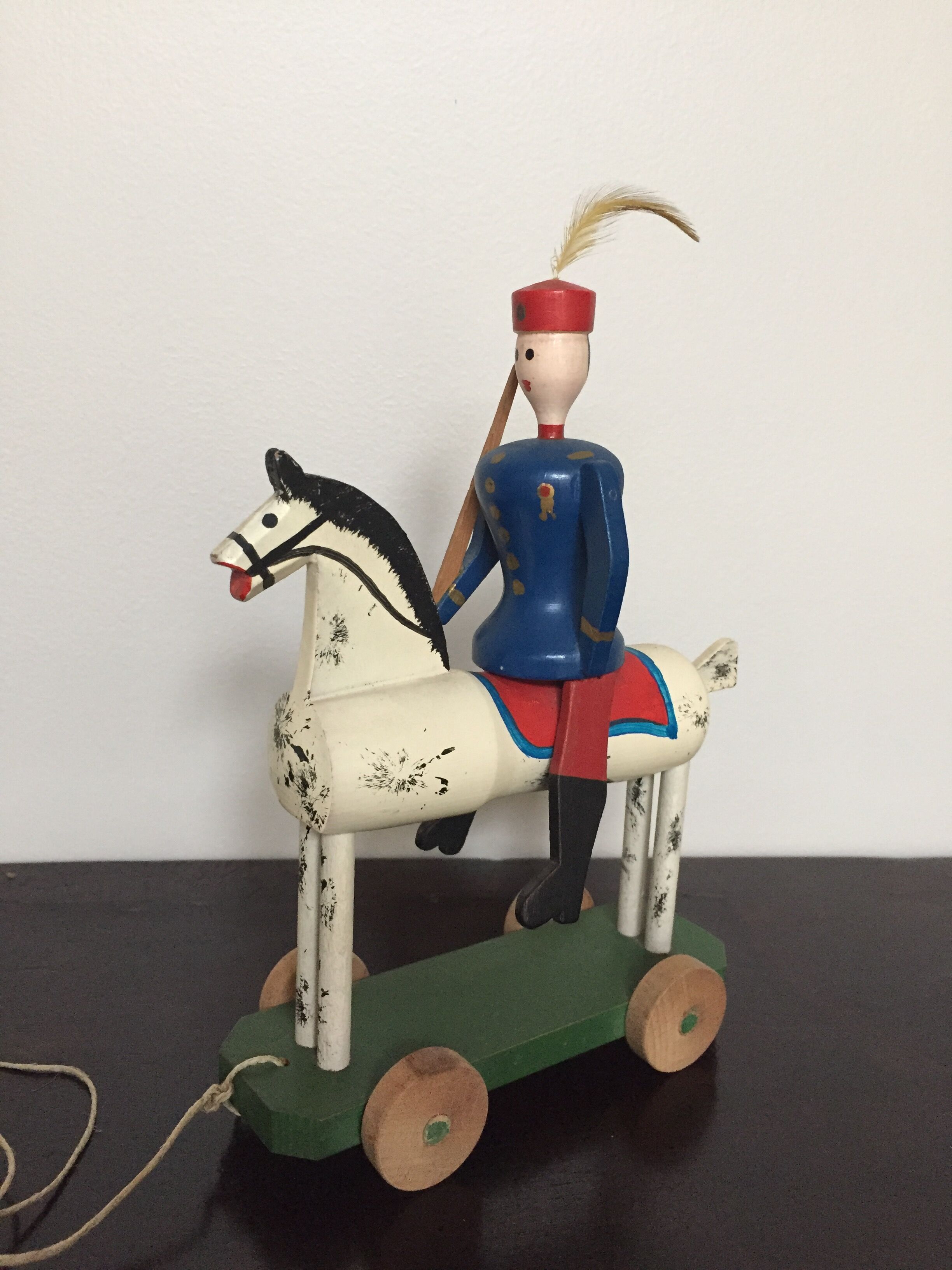 Soldier on wooden horse to shoot