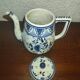 Henriot Quimper earthenware coffee set with floral decoration and elegant blue