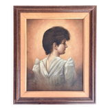 Jeune femme du XIXe siècle, capturée dans l'élégance tranquille.