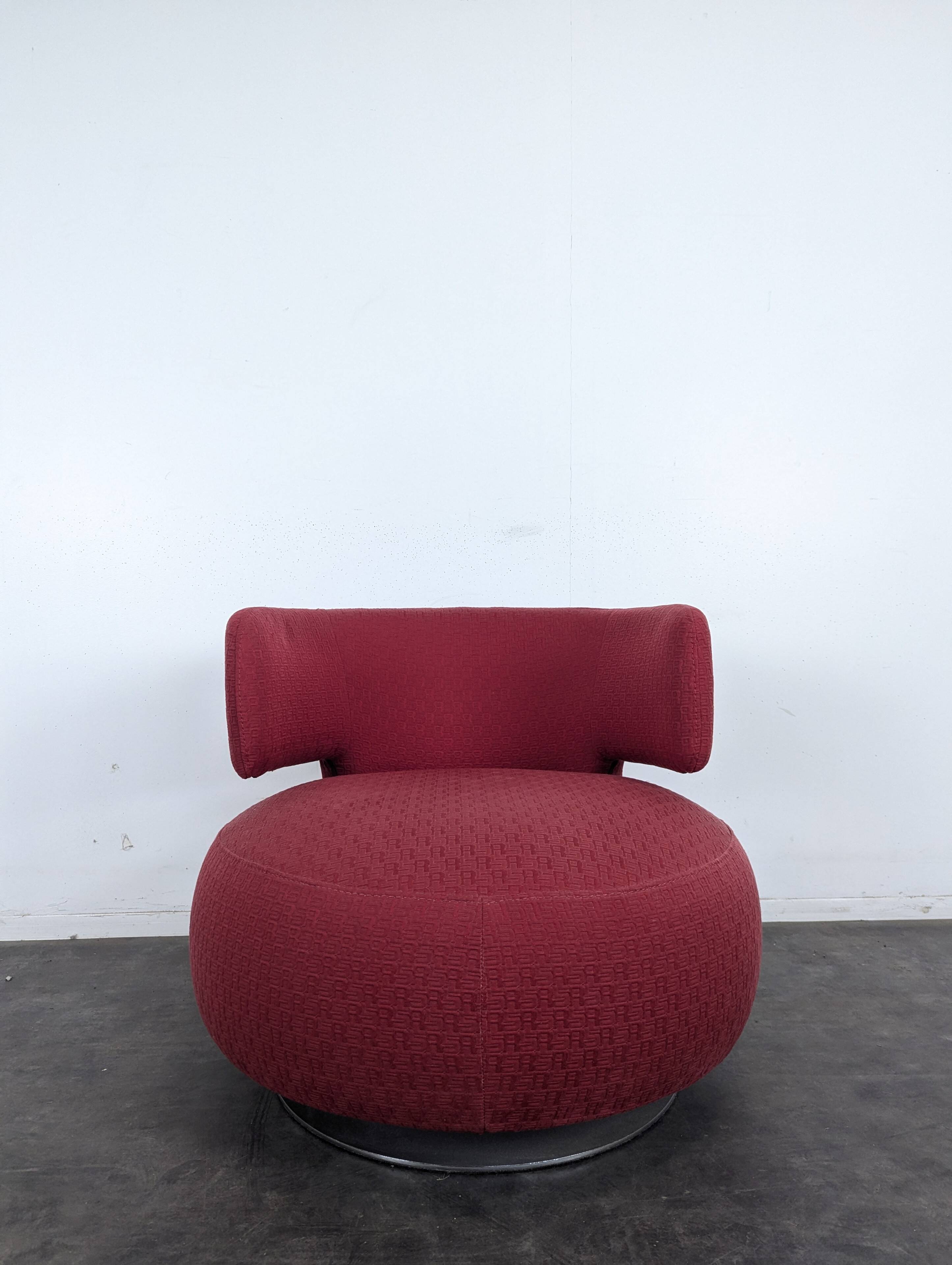 Roche Bobois swivel chair in red fabric with 2000s patterns.